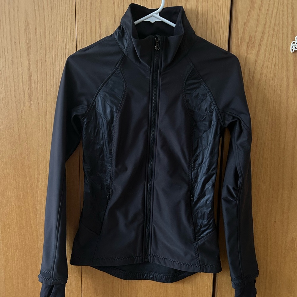 Lululemon jacket size 2. Super cute, warm, stylish, water resistant, ruffles